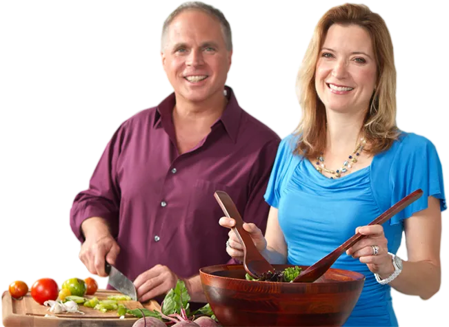 Ed and Dr. Cederquist making a salad 