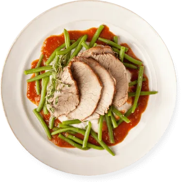 Pork Tenderloin on Green Beans and Sauce