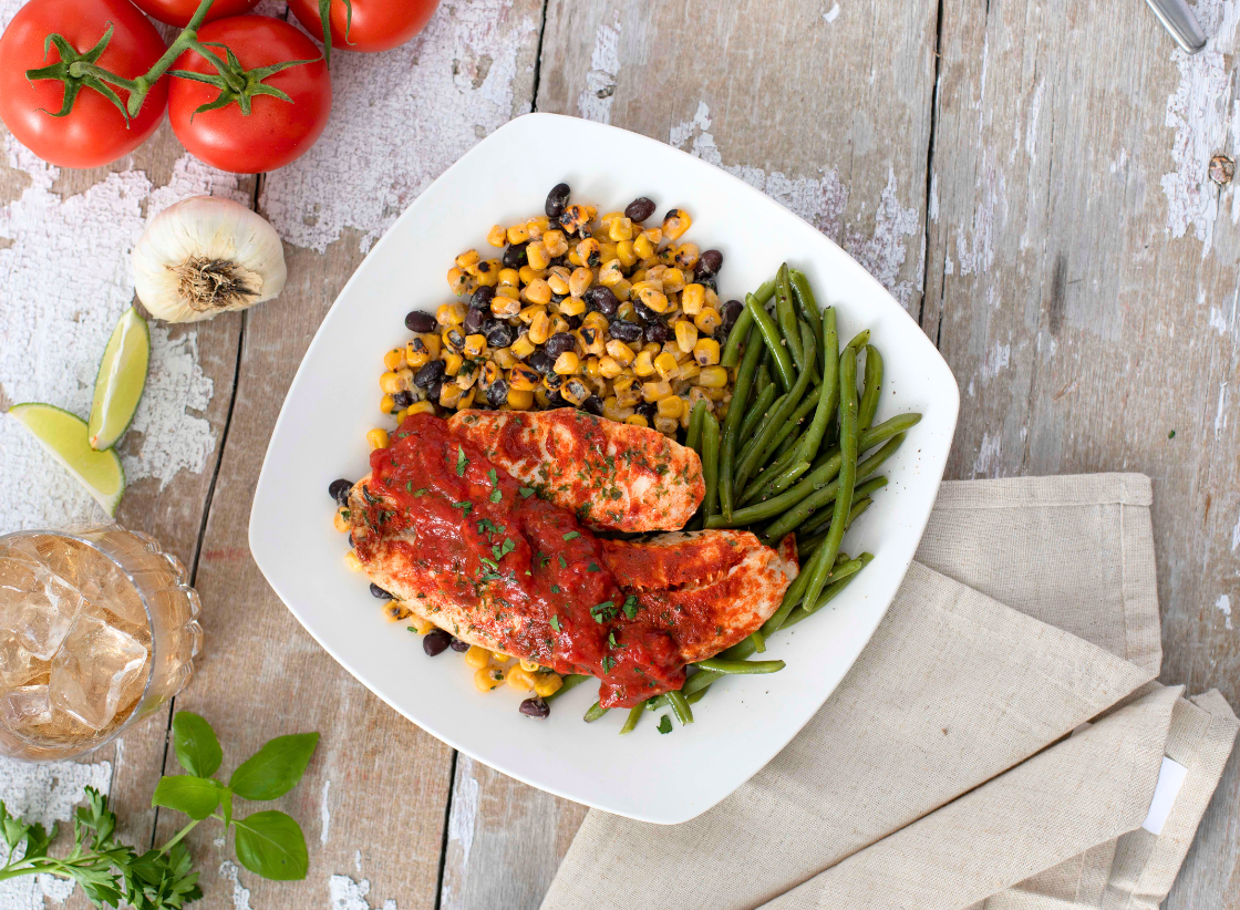 Tilapia with Smokey Tomato Sauce and Black Bean Street Corn