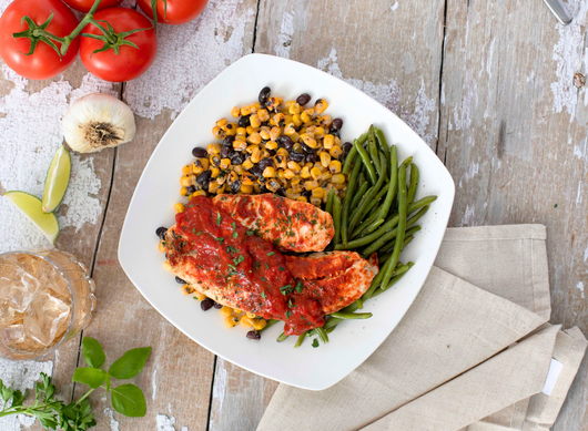 Tilapia with Smokey Tomato Sauce and Black Bean Street Corn